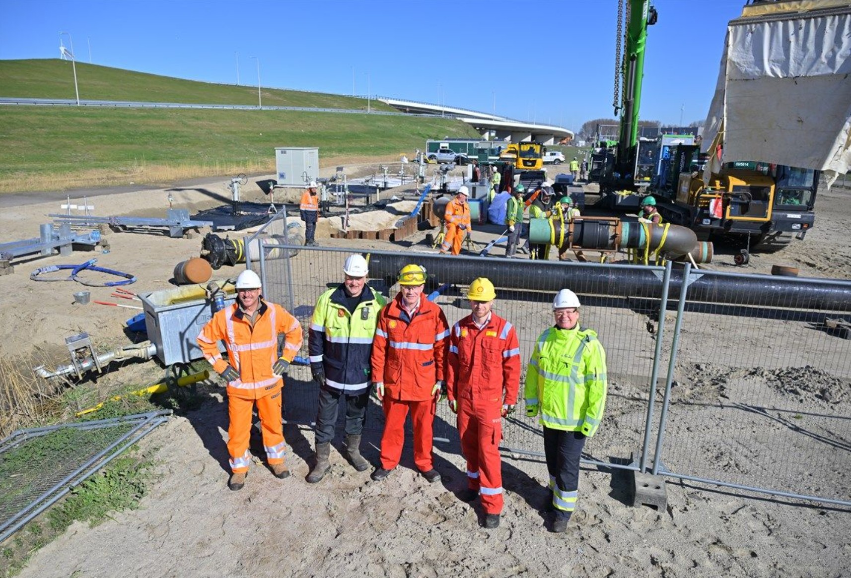 Gouden las Shell met Porthos